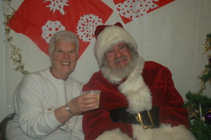 June is happily cheering Santa with some yummy eggnog