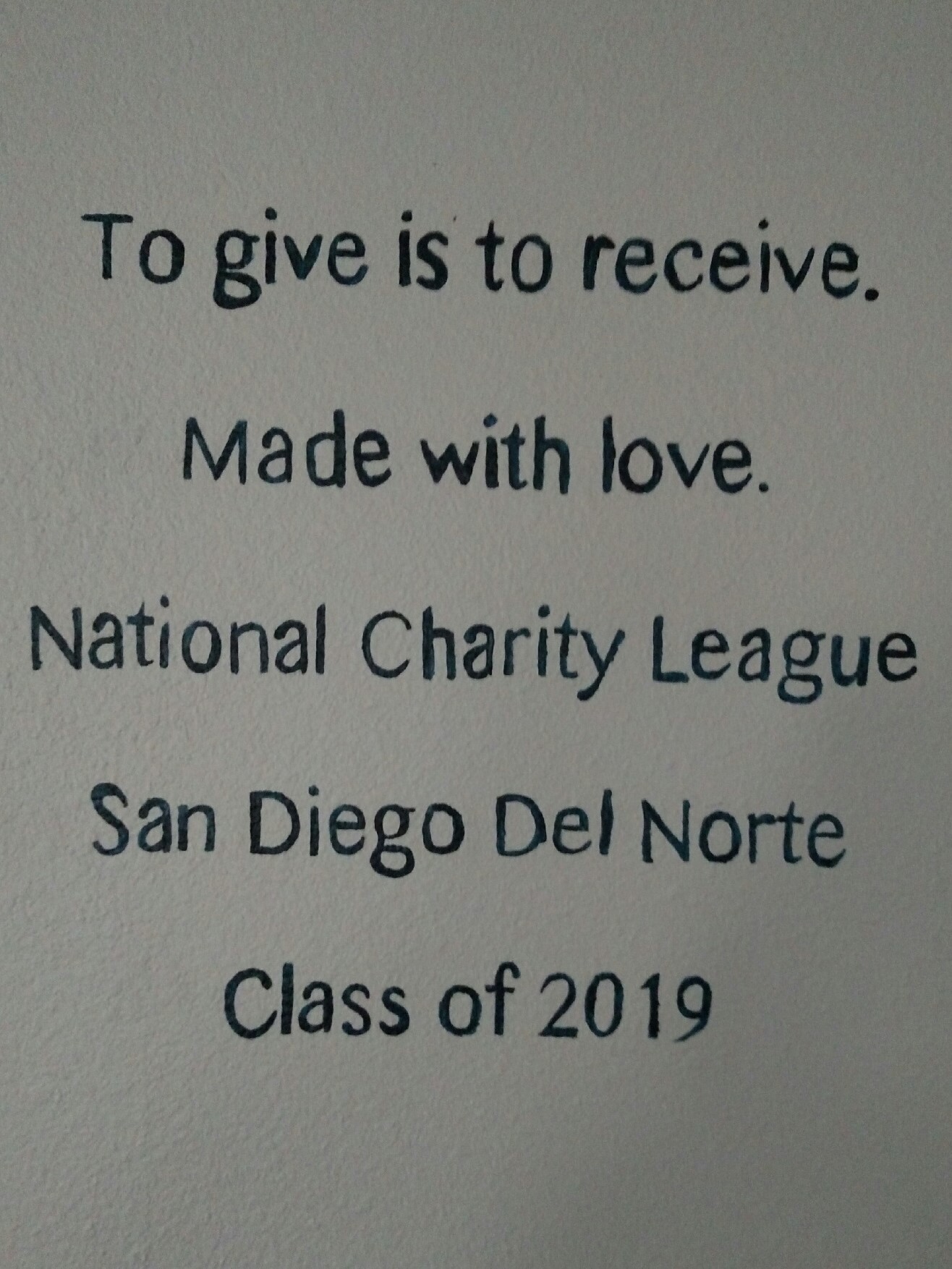 Plaque with a charitable message and dedication from 2019 class.